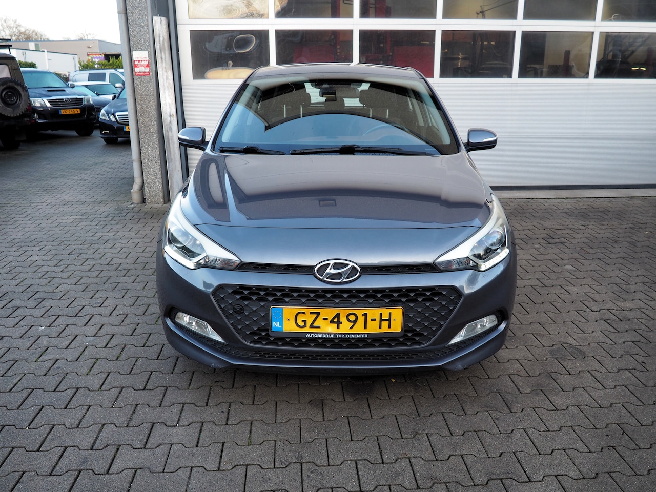 Hyundai i20 - 1.2 HP i-Motion AIRCO CRUISE PARKEER S. NW KOPPELING