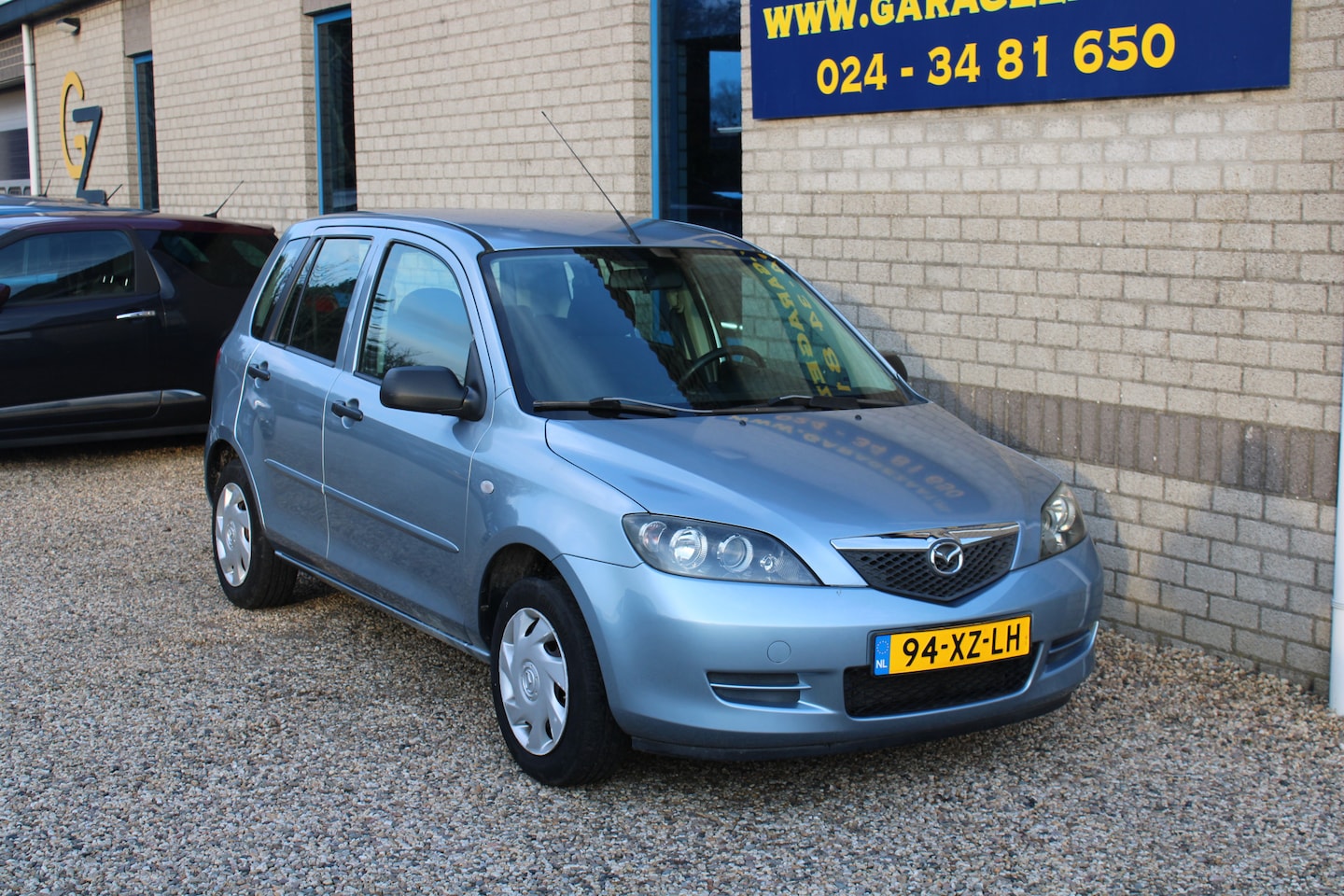 Mazda 2 - 1.4 Exclusive Airco weinig km - AutoWereld.nl