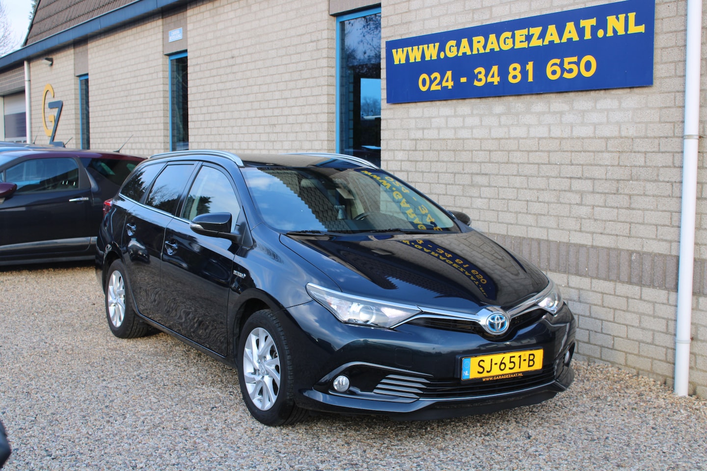 Toyota Auris Touring Sports - 1.8 Hybrid Dynamic clima navi camera dealer onderhouden - AutoWereld.nl