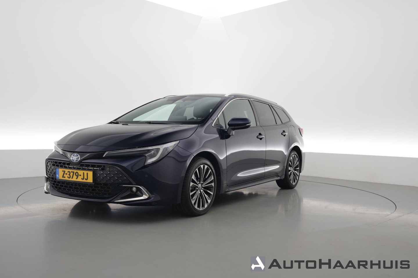 Toyota Corolla Touring Sports - 1.8 First Edition Hybrid 140 | Adapt. Cruise | Stoel- Stuurverw. | Keyless | Camera | Appl - AutoWereld.nl