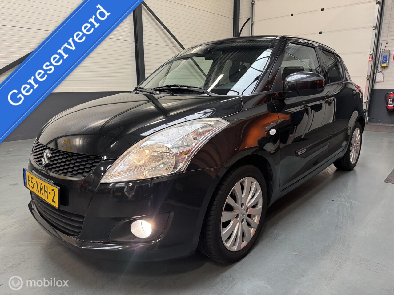 Suzuki Swift - 1.2 Exclusive Carplay|Clima|Cruise|NL-Auto! - AutoWereld.nl