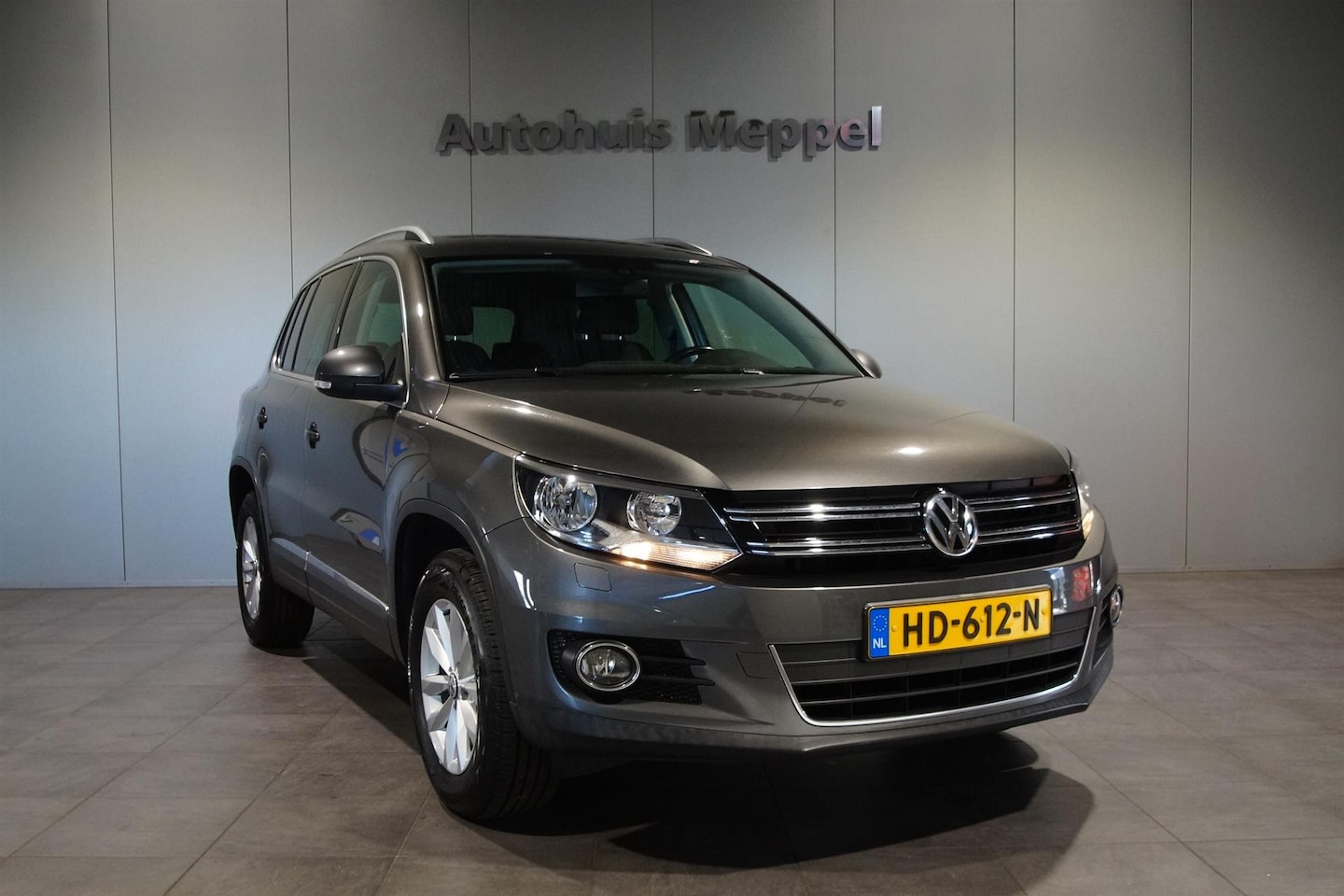 Volkswagen Tiguan - 1.4 TSI | Navigatie | Trekhaak | PDC | Sportuitrusting | - AutoWereld.nl