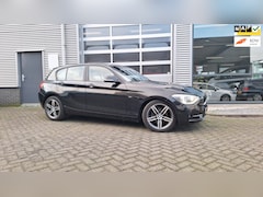 BMW 1-serie - 114i Upgrade Edition/Leer/Sportstoelen/Navigatie/Lm Velgen/Enz