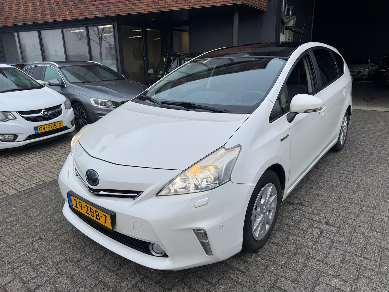 Toyota Prius Wagon - 1.8 Dynamic 7 ZITS XENON PANO JBL CAMERA HUD ORIG NL - AutoWereld.nl