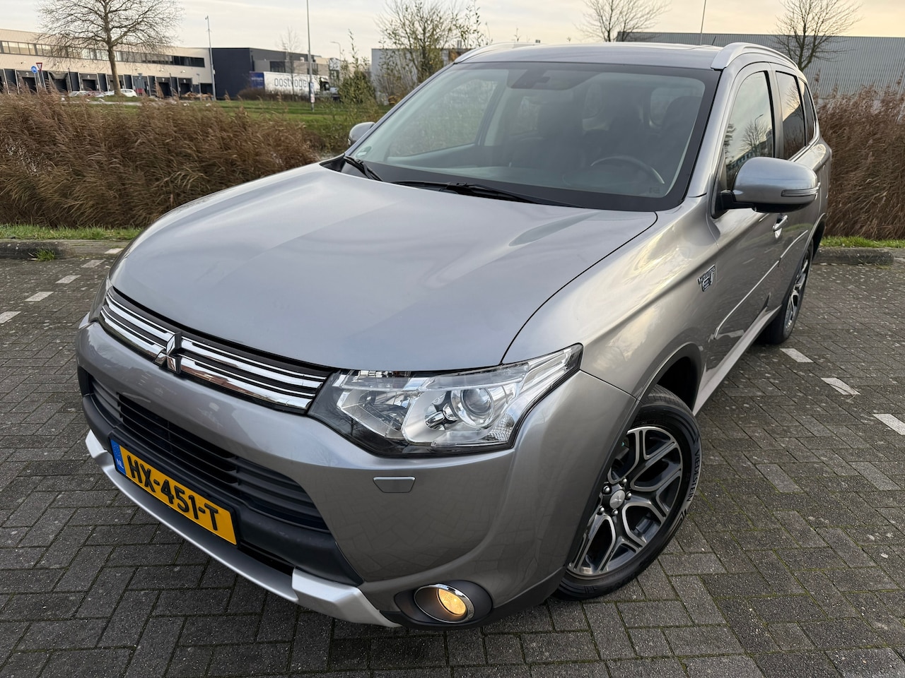 Mitsubishi Outlander - 2.0 PHEV Executive Edition*CAMERA*NAVI*OPEN -DAK*LEER*CRUISE*STOEL VERWARMING - AutoWereld.nl