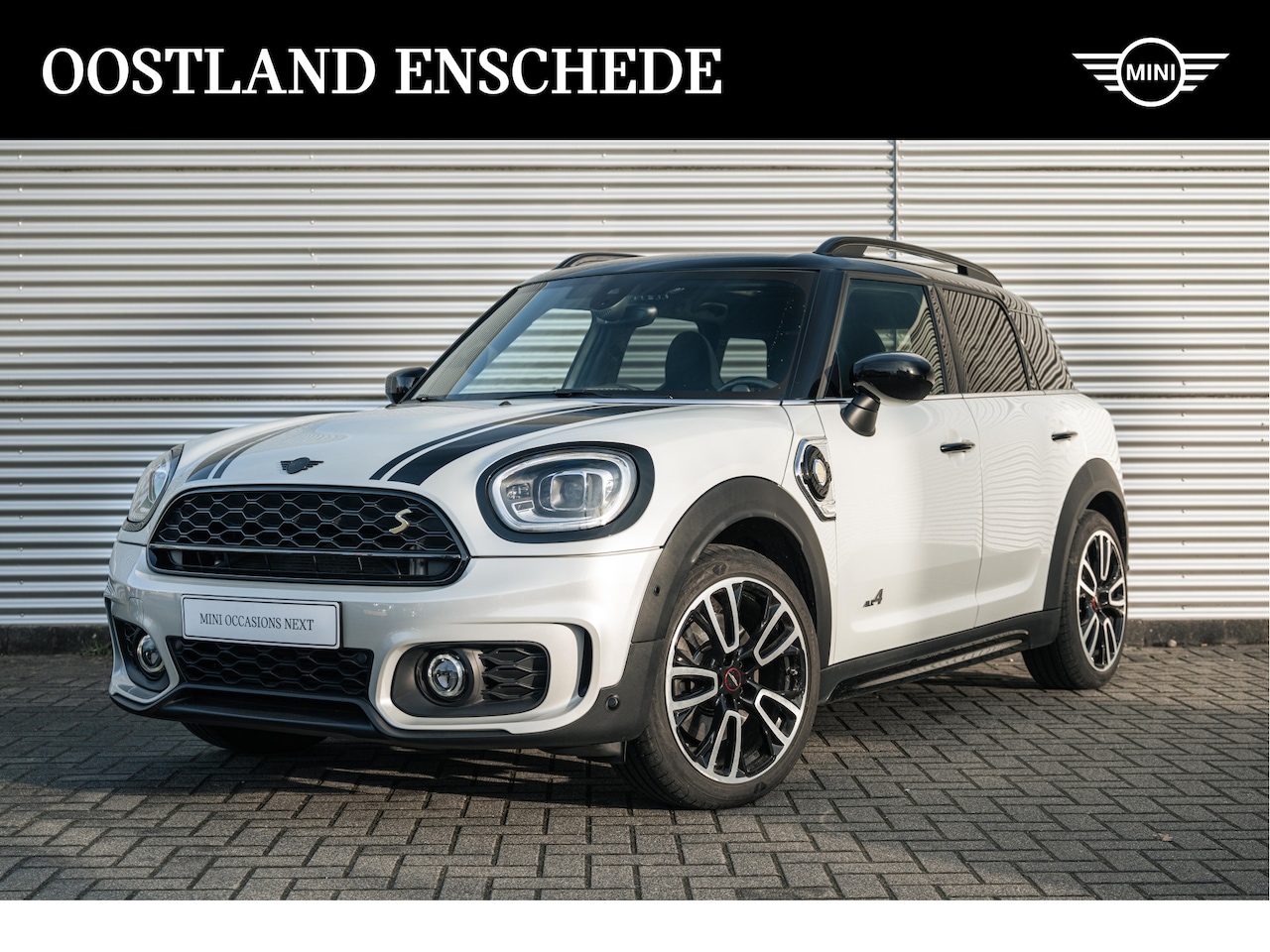 MINI Countryman - Cooper S E ALL4 Automaat / John Cooper Works / Panoramadak / JCW Sportstoel / Achteruitrij - AutoWereld.nl