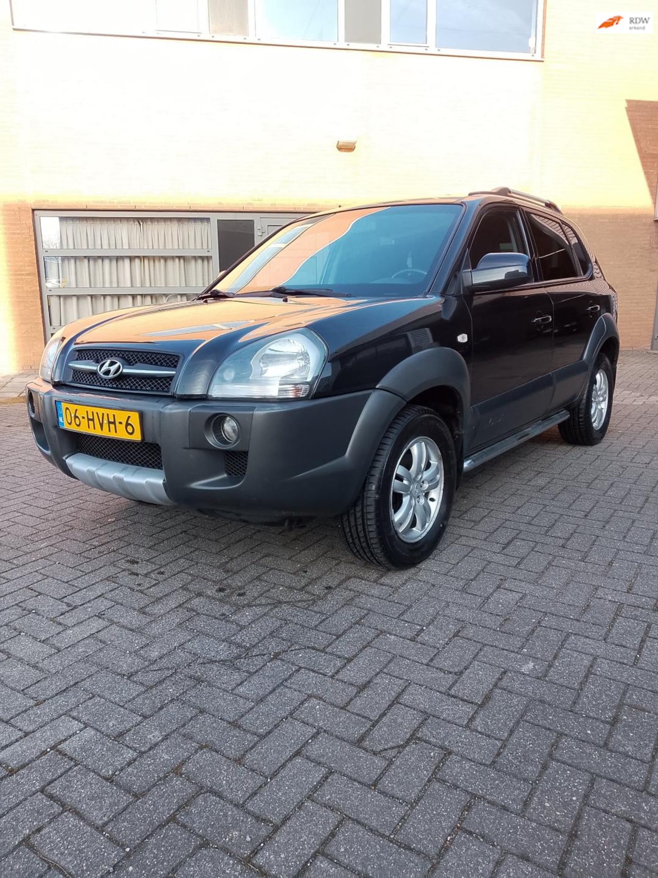 Hyundai Tucson - 2.0i Style Cross 2.0i Style Cross - AutoWereld.nl