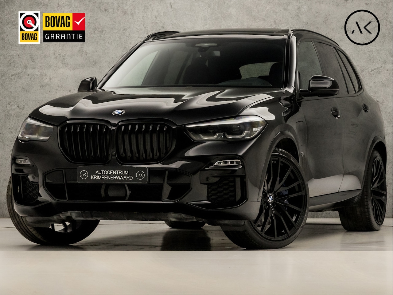 BMW X5 - xDrive45e M Sport High Executive 395Pk Automaat (PANORAMADAK, LUCHTVERING, ARMSTEUN VERWAR - AutoWereld.nl