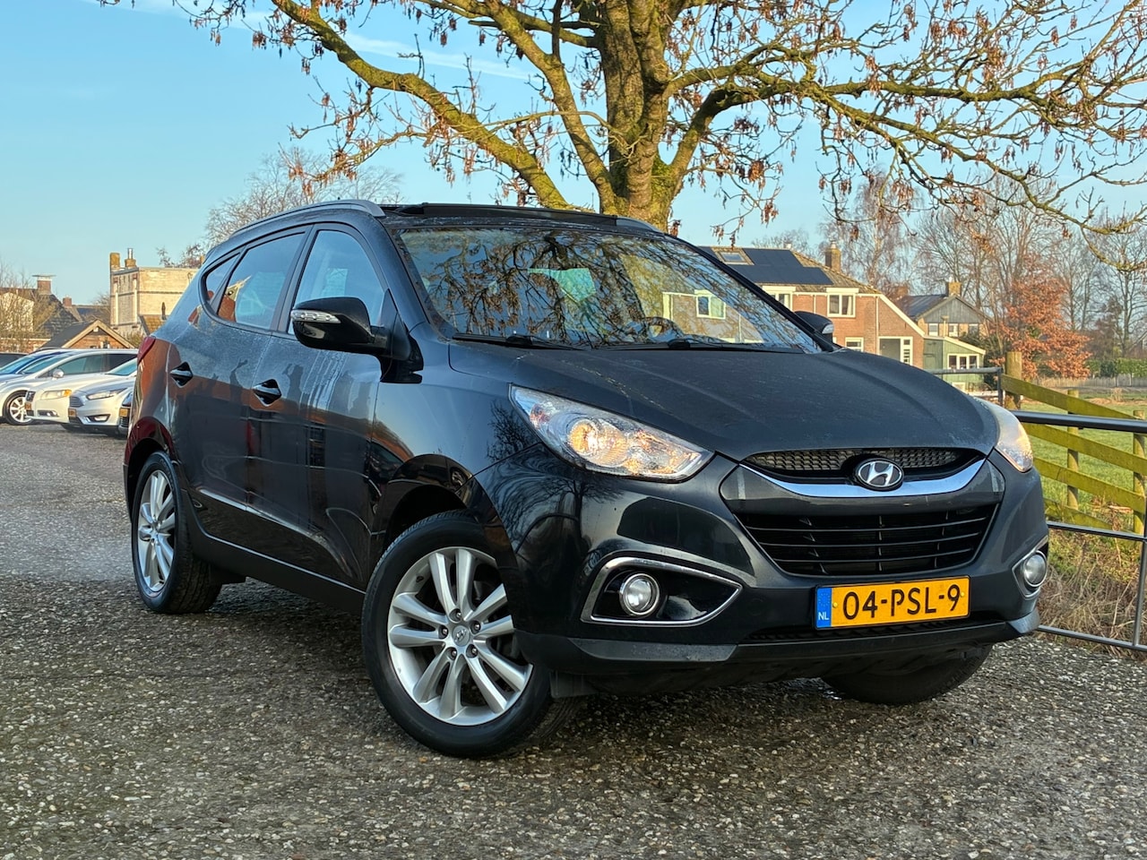Hyundai ix35 - 2.0i i-Catcher | Leder + Schuif/kantel dak + Key-less nu € 7.975,-!!! - AutoWereld.nl