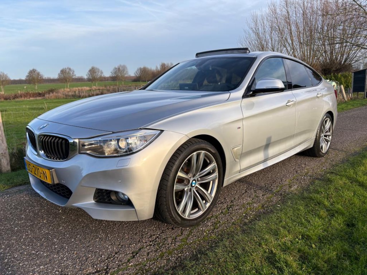 BMW 3-serie Gran Turismo - 320i Centennial High Executive M-Sport - AutoWereld.nl