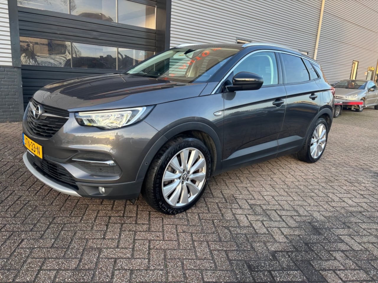 Opel Grandland X - 1.6 T Hybr Ultimate PLUG-IN 6 MND GAR | LEER | CARPLAY | NAVI | - AutoWereld.nl