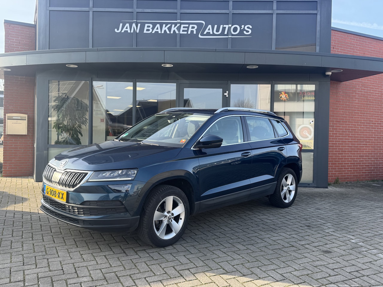 Skoda Karoq - 1.5 TSI ACT Business Edition ✅ Automaat ✅ Carplay ✅ Keyless ✅ Camera ✅ - AutoWereld.nl