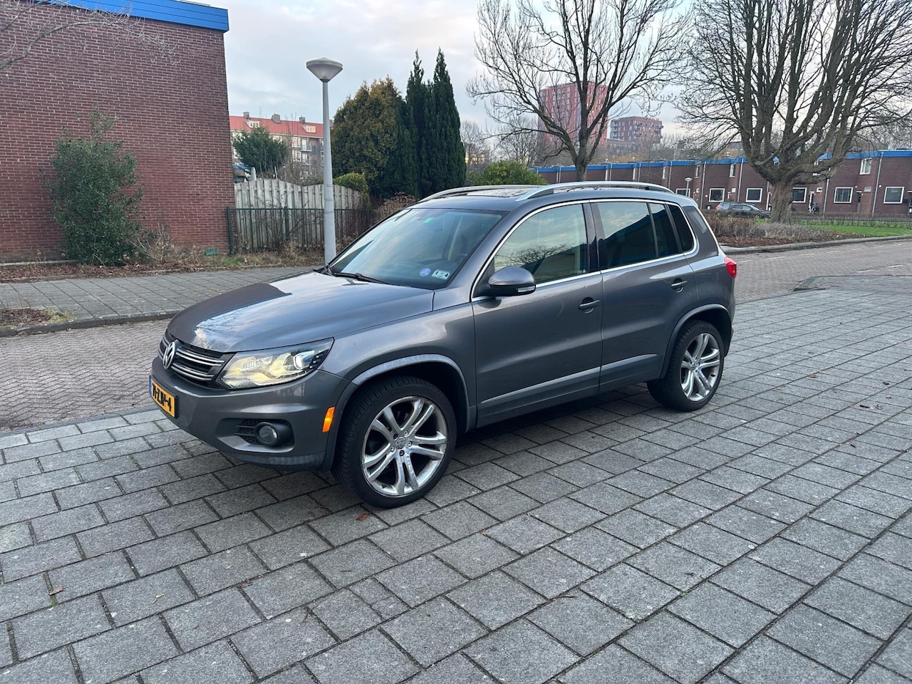 Volkswagen Tiguan - 2.0 TSI Automaat Sport&Style 4Motion Panorama Leder - AutoWereld.nl
