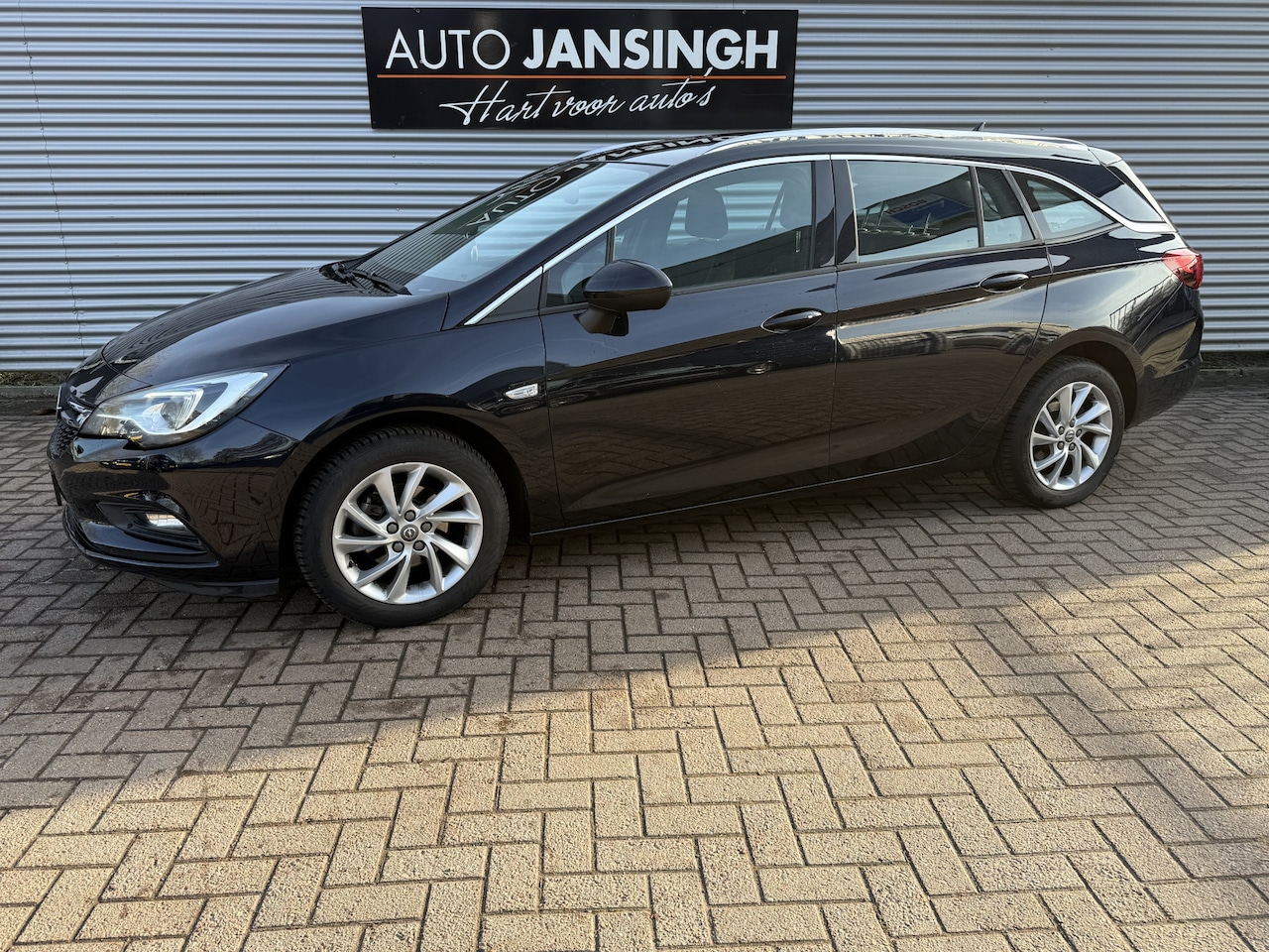Opel Astra Sports Tourer - 1.0 Turbo Innovation | Navigatie | Cruise Control | Lane Assist | Trekhaak | Apple Carplay - AutoWereld.nl