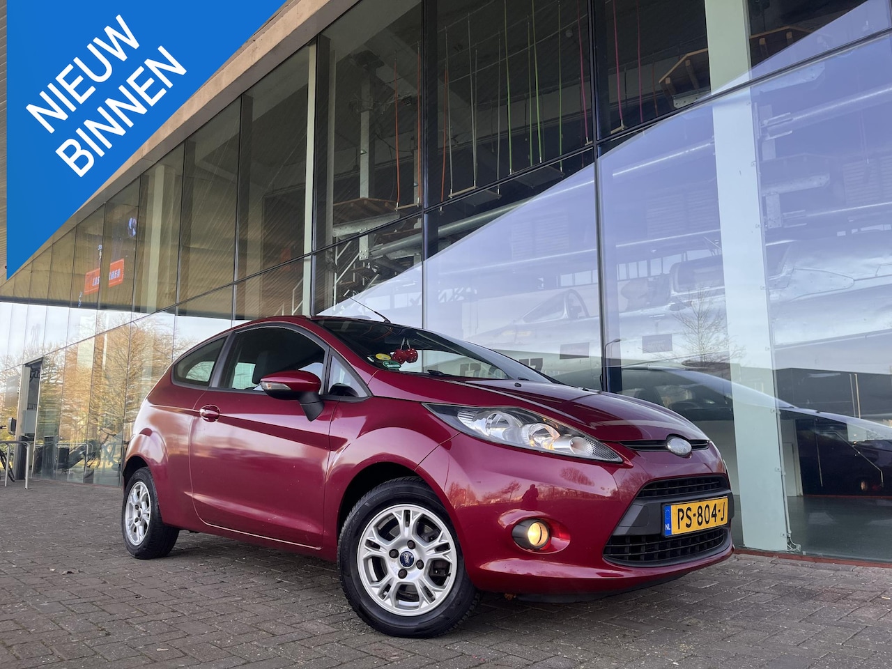 Ford Fiesta - 1.25 Ghia-82 PK STOELVERWARMING-BLUETOOTH-AIRCO - AutoWereld.nl