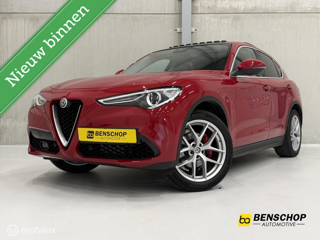 Alfa Romeo Stelvio - 2.0 T AWD First Edition Alfa Rosso Panodak Leer Navi Memory 20 inch - AutoWereld.nl