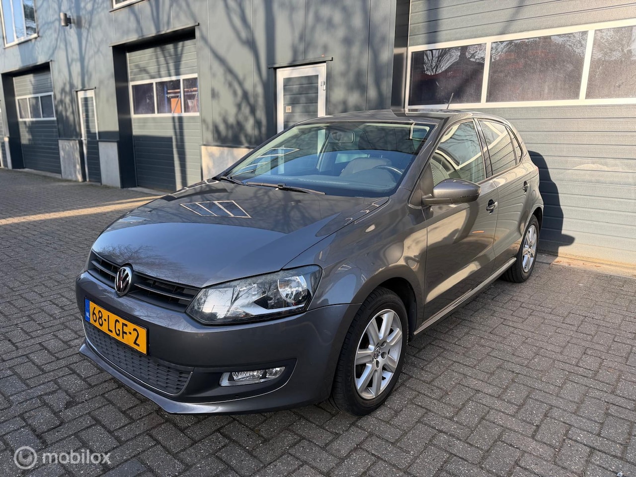 Volkswagen Polo - 1.2 TSI Highline/2e Eigenaar/5deurs/Airco - AutoWereld.nl