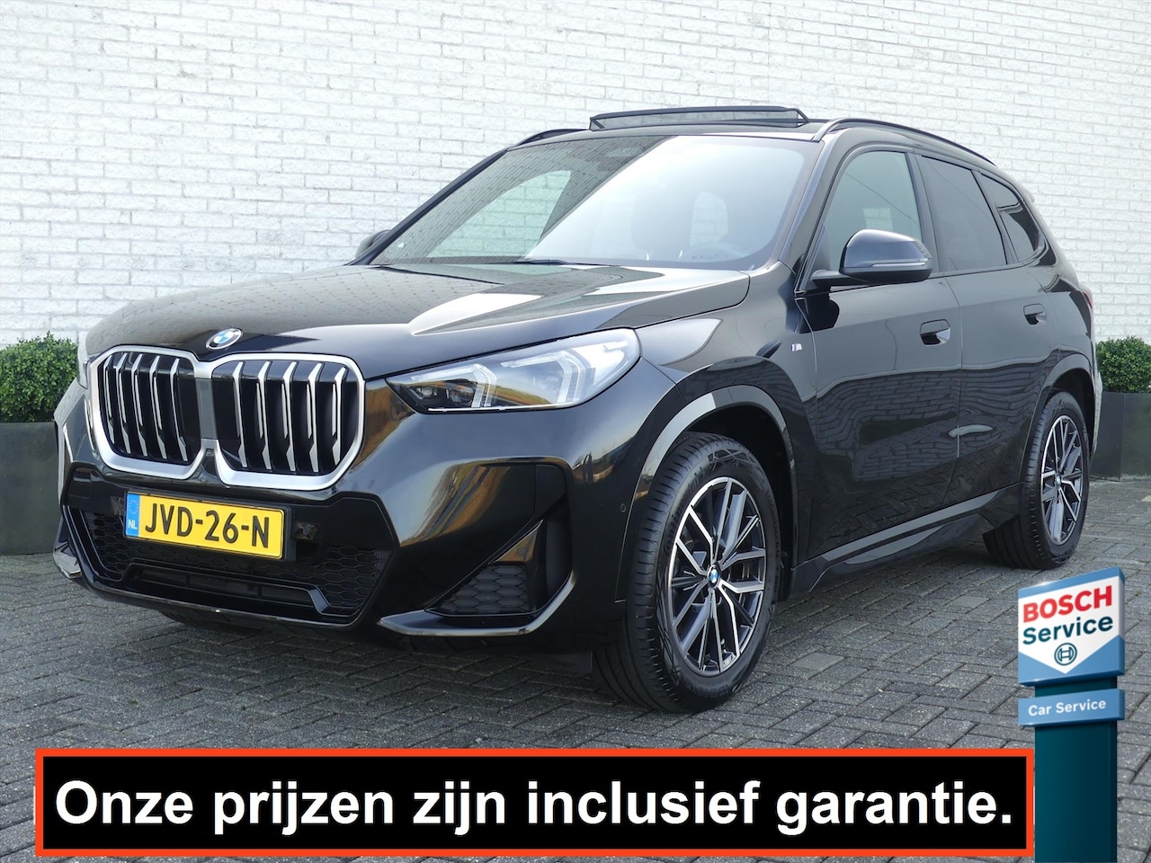 BMW X1 - 18i M-SPORT 136PK AUTOMAAT TREKHAAK/PANO.DAK/CAMERA/ELEK.A-KLEP - AutoWereld.nl