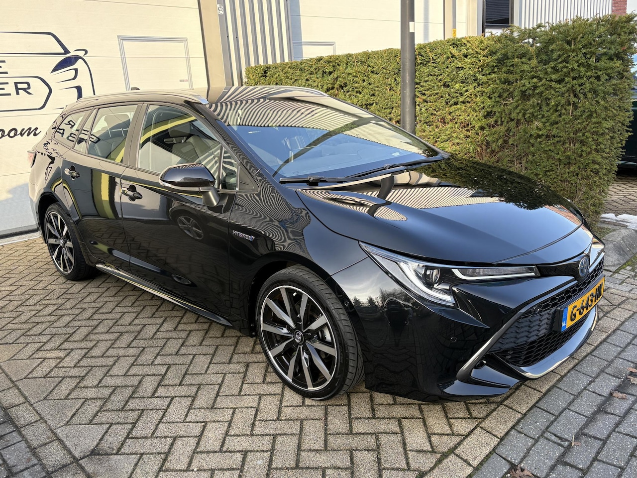 Toyota Corolla Touring Sports - 1.8 Hybrid Business Intro LED, Head-Up, Camera, Stoelverwarming, Navigatie, Keyless Entry - AutoWereld.nl