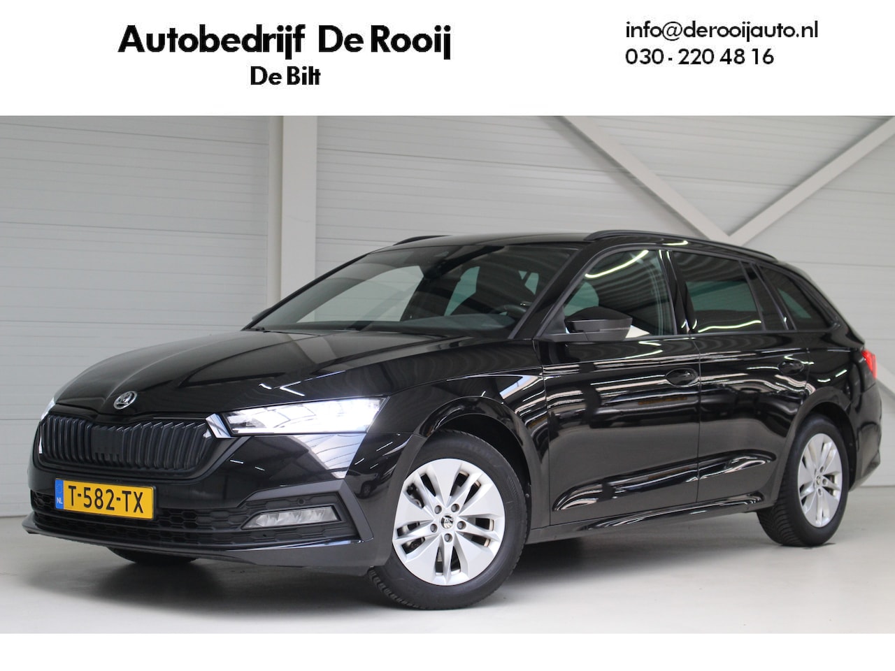 Skoda Octavia Combi - 1.0 TSI Sport Business Navigatie | Parkeersensoren | Stoelverwarming - AutoWereld.nl
