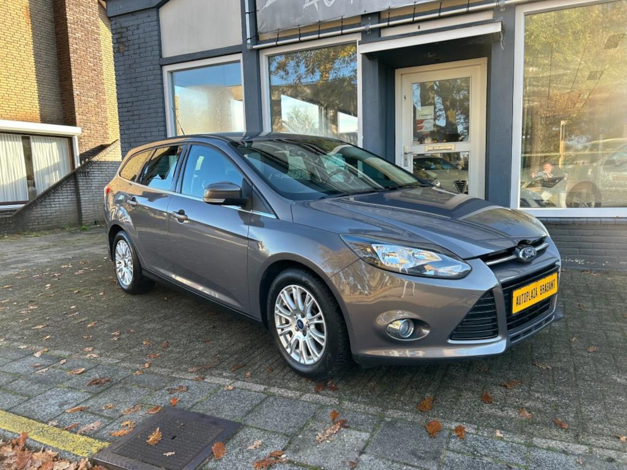 Ford Focus Wagon - 1.6 EcoBoost Titanium / NAVI / ACHTERUITRIJ CAMERA - AutoWereld.nl