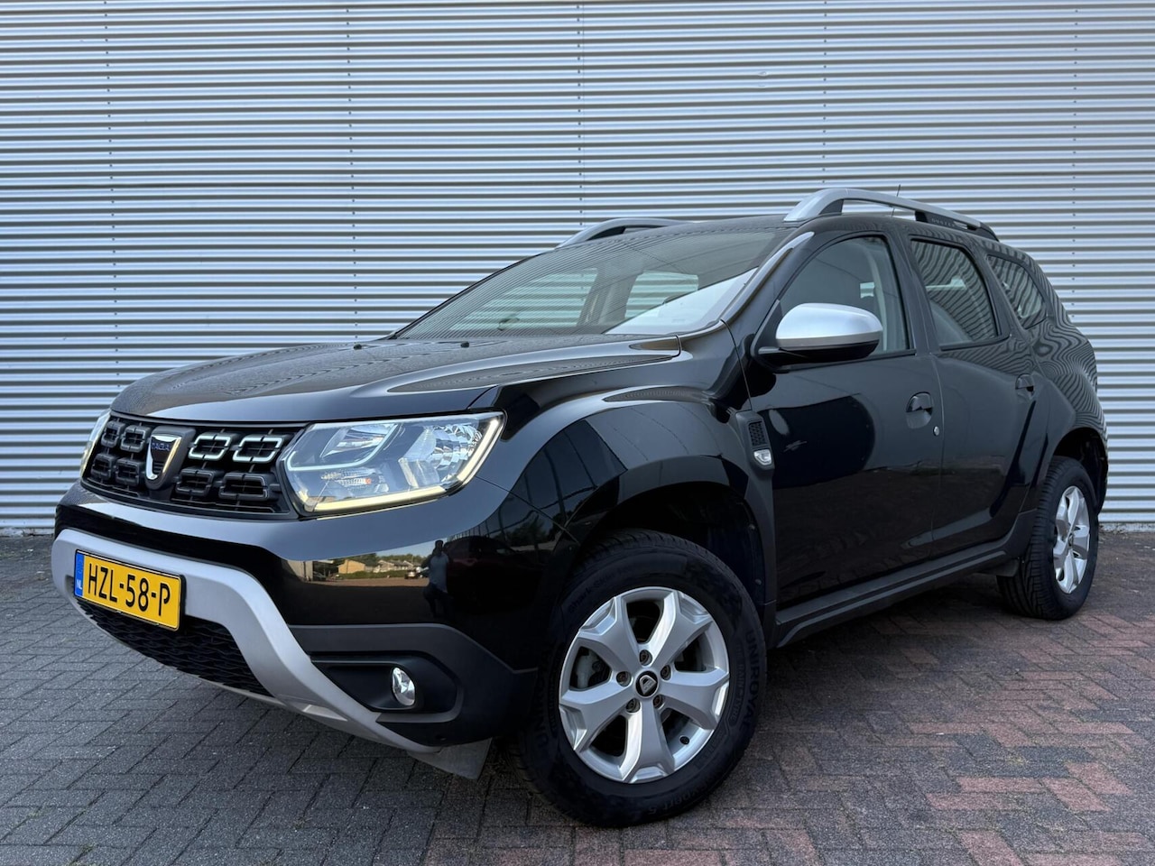 Dacia Duster - 1.0 TCe Comfort Carplay Hoge Instap Airco Led 2021 Eerste Eigenaar Vol Opties 89629 KM Ger - AutoWereld.nl