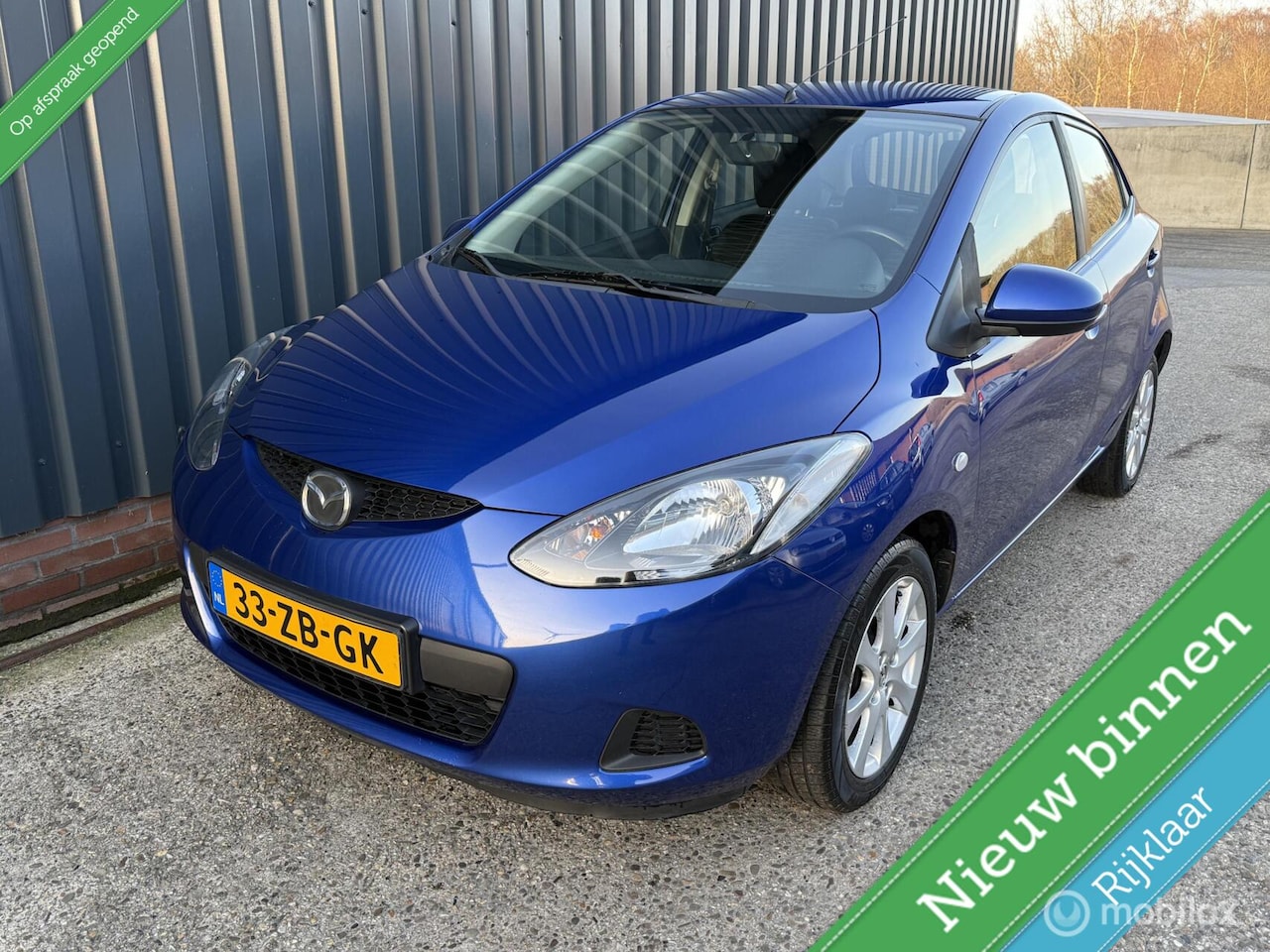 Mazda 2 - 1.3 S-VT Touring NAP/NWE APK/AIRCO/STOELVERWARMING/5DRS - AutoWereld.nl