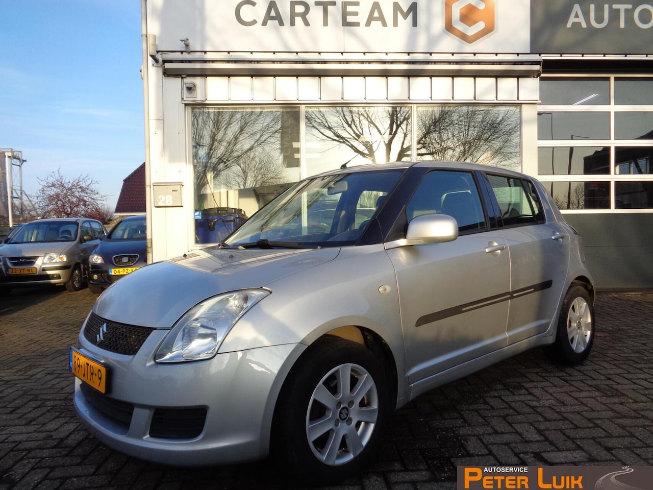 Suzuki Swift - 1.3 Comfort met AIRCO - AutoWereld.nl