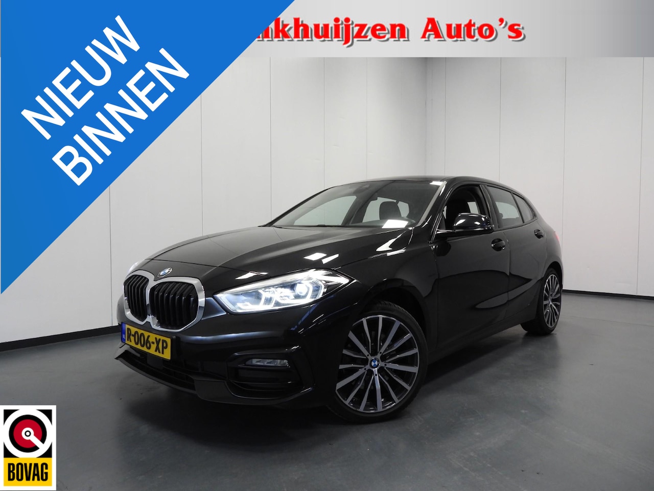 BMW 1-serie - 118i Aut. Intro Sport Line VOL LEER/NAVI/CAMERA/LED/18"LMV! - AutoWereld.nl