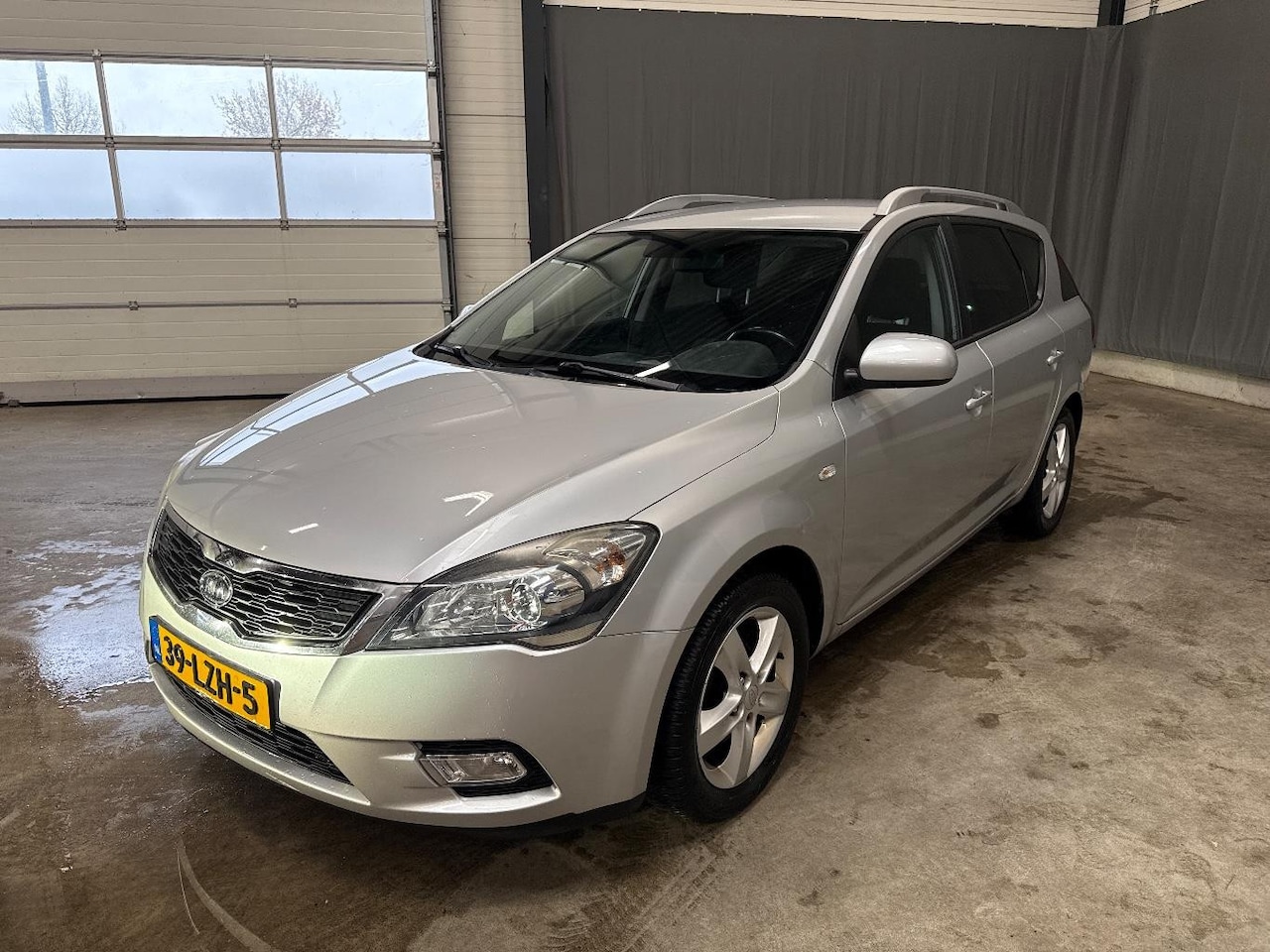 Kia Cee'd - 1.4 CVVT X-ecutive 1.4 CVVT X-ecutive - AutoWereld.nl