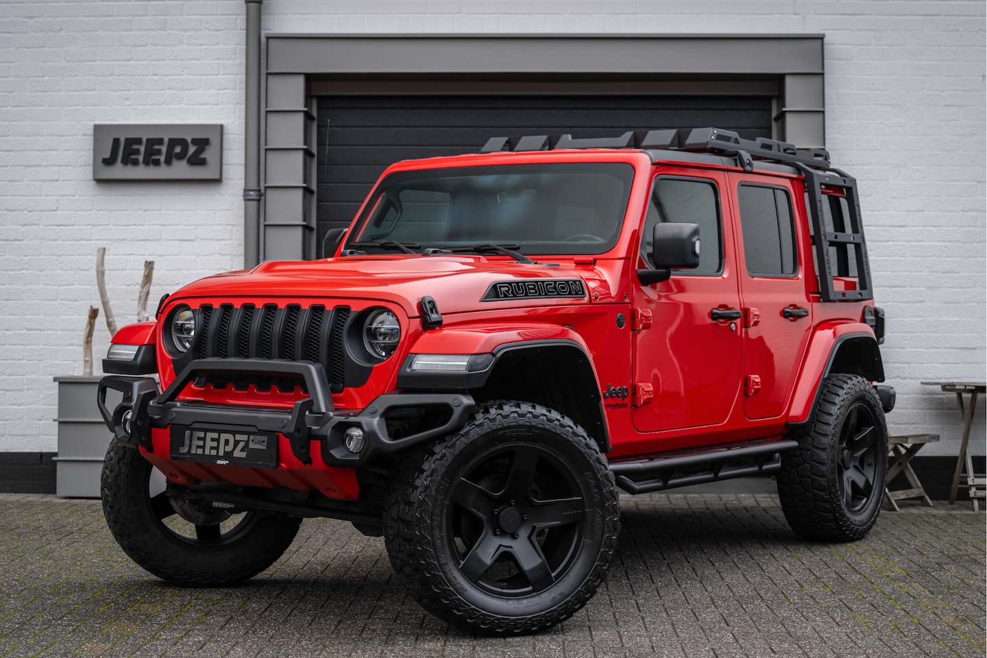 Jeep Wrangler Unlimited - 2.0T - Method velgen 20" - Liftkit - Dakrek - stalen V&A bumper - AutoWereld.nl