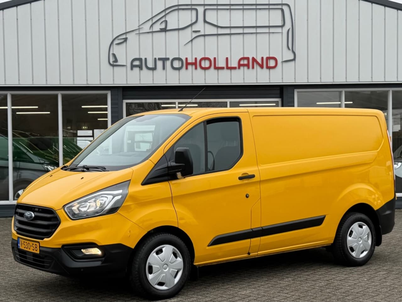 Ford Transit Custom - 2.0 TDCI 96KW 131PK EURO 6 AIRCO/ CRUISE CONTROL/ PARKEERSENSOREN/ 100% DEALERONDERHOUDEN - AutoWereld.nl