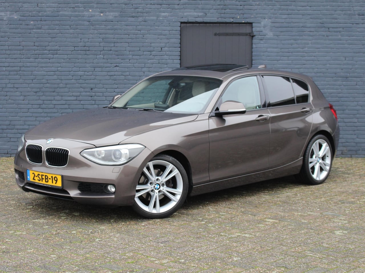 BMW 1-serie - 118i High Executive zeer compleet en perfect onderhouden 8 traps automaat - AutoWereld.nl