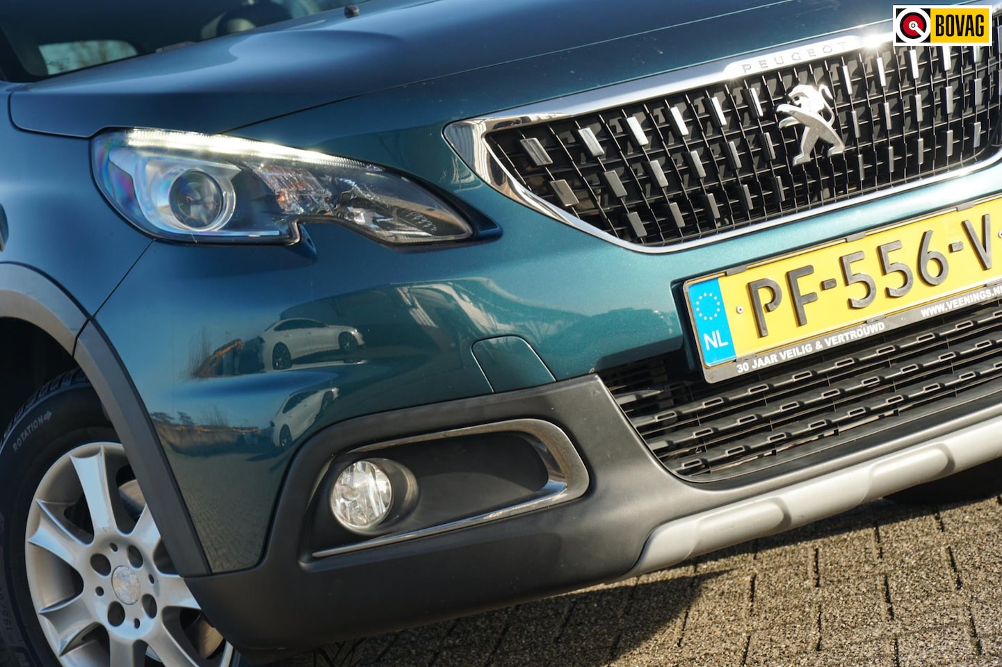 Peugeot 2008 - 1.2 PureTech Allure | Emerald Crystel | AppleCarplay/Clima/Cruise/Camera - Keurig! - AutoWereld.nl