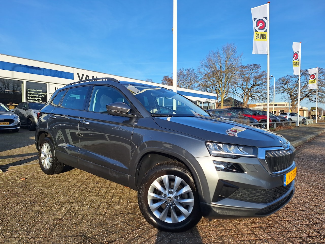 Skoda Karoq - 1.0 TSI Ambition CLIMA+NAVI+PDC V/A+STOELVERWARMING - AutoWereld.nl