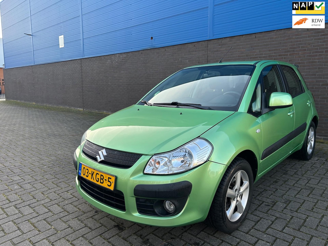 Suzuki SX4 - 1.6 Exclusive | Automaat | Cruise | Climate | Parkeersensoren | Camera | Keyless | 16” LM - AutoWereld.nl
