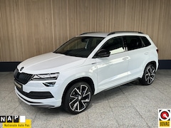 Skoda Karoq - 1.5 TSI Sportline Business NL auto | Trekhaak | Camera | Carplay