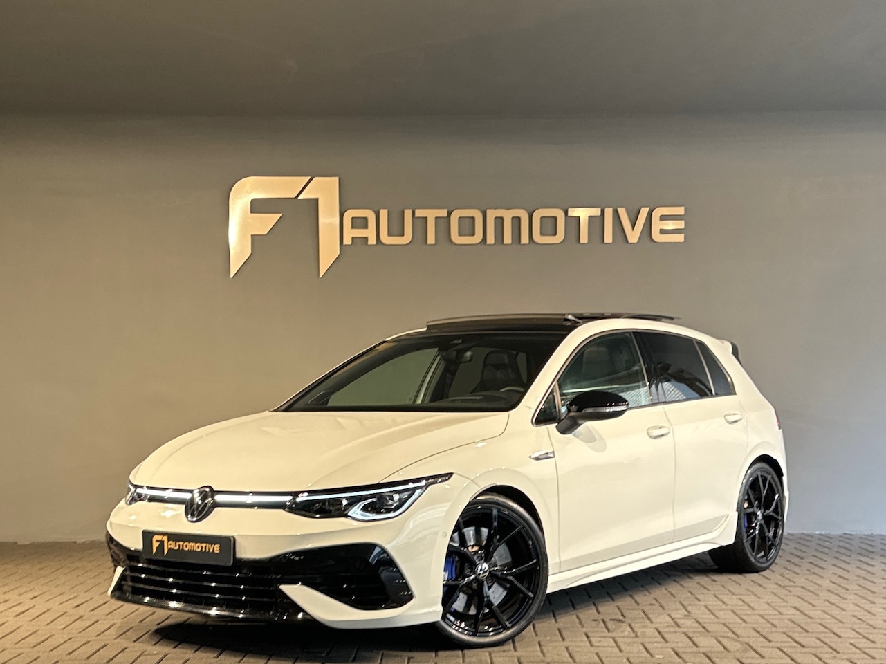 Volkswagen Golf - 2.0 TSI R 4M Performance Pano|HuD|Akra|Memory - AutoWereld.nl