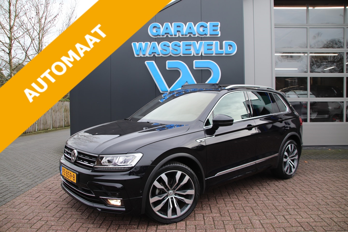 Volkswagen Tiguan - 1.4 TSI DSG R-Line NL 1-Eigenaar Pano/Trekhaak/ACC/Carplay/Uniek - AutoWereld.nl