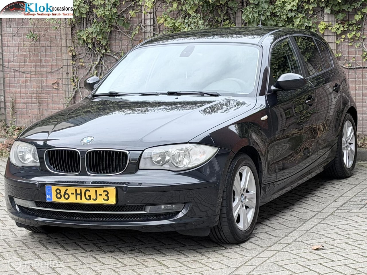 BMW 1-serie - 118i Business Line NAP Airco Cruise 5Deurs - AutoWereld.nl