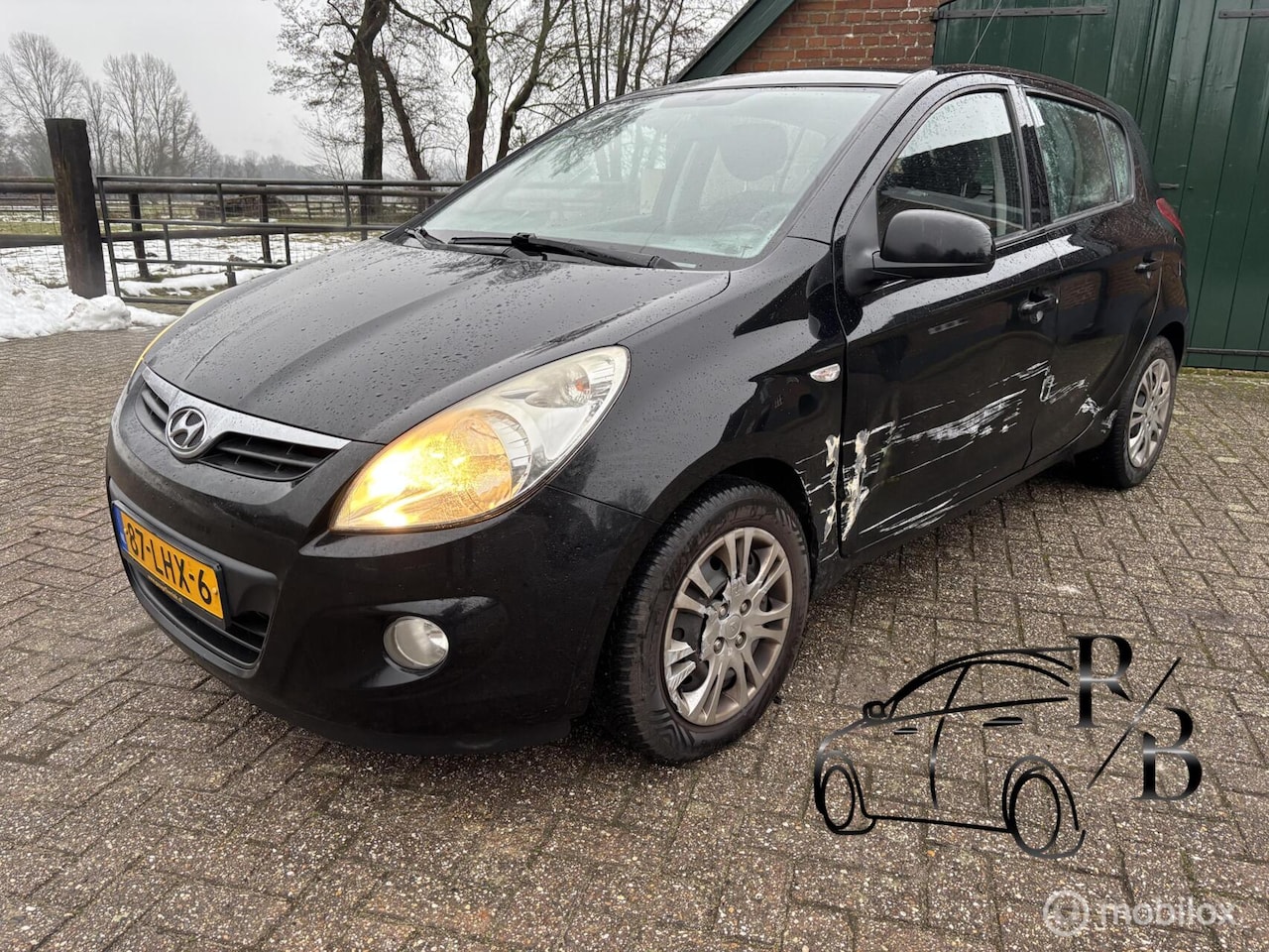 Hyundai i20 - 1.4i DynamicVersion AC SCHADE LINKS HANDELSPRIJS - AutoWereld.nl