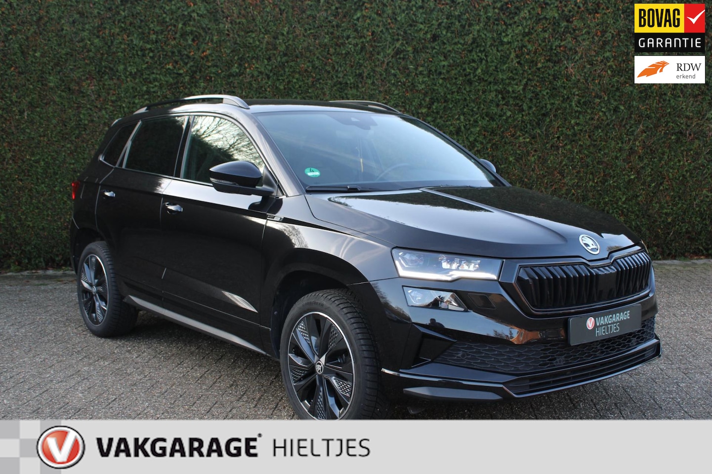 Skoda Karoq - 1.5 TSI ACT Sportline Business model 2023 2+2 fabrieksgarantie - AutoWereld.nl