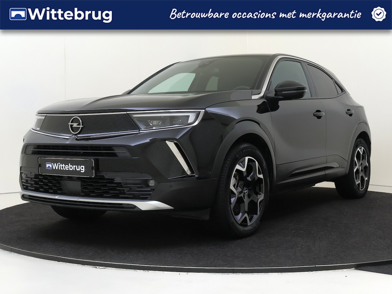 Opel Mokka-e - Ultimate 136 PK 50-kWh 11kw bl. Camera | Navigatie | Stoel en Stuurverwarming | Apple Carp - AutoWereld.nl