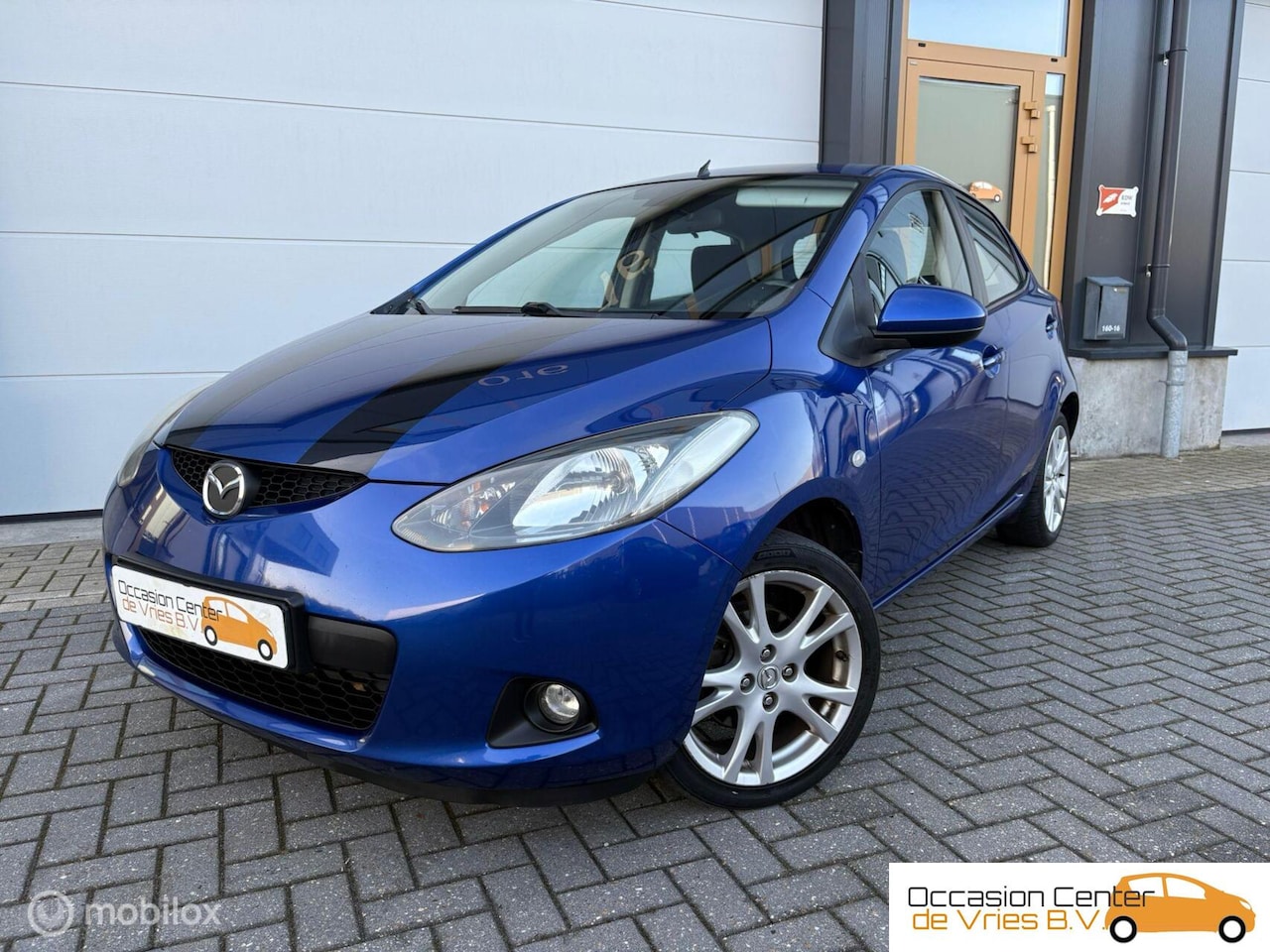 Mazda 2 - 1.3 5drsAircoVelgenNavi/CarplayElektrPakketBluetooth - AutoWereld.nl