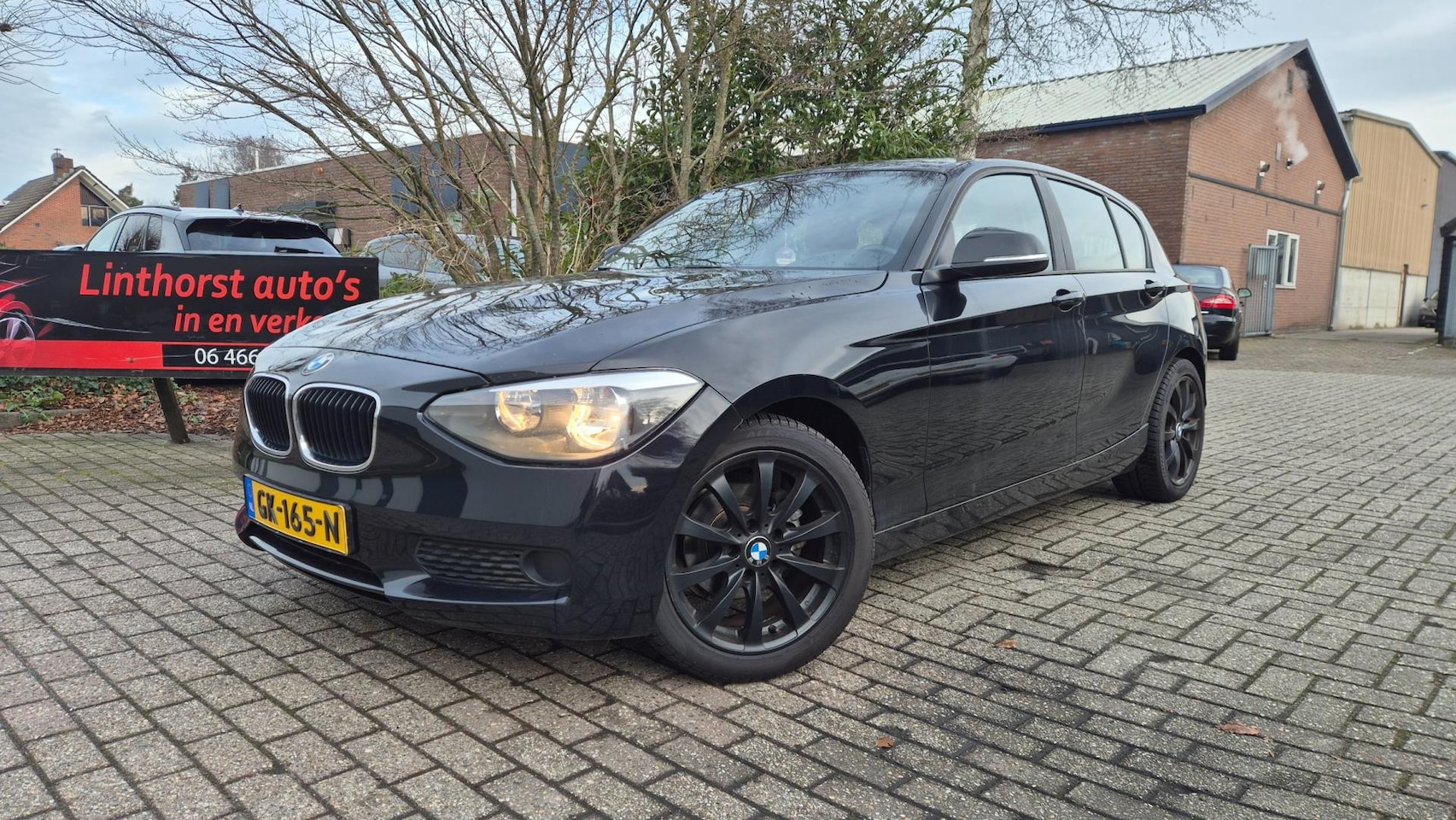 BMW 1-serie - 118d Business CLIMA-NAVI-BJ 2013 - AutoWereld.nl