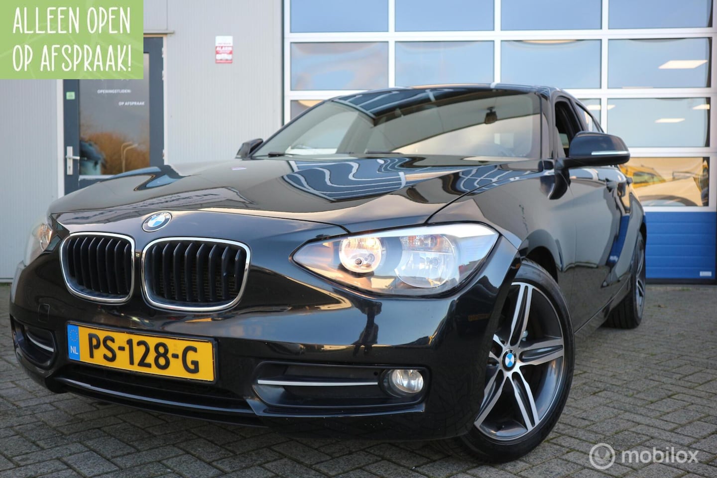 BMW 1-serie - 116i Sport AIRCO-ECC/NAVIGATIE/PDC/TREKHAAK/LMV - AutoWereld.nl