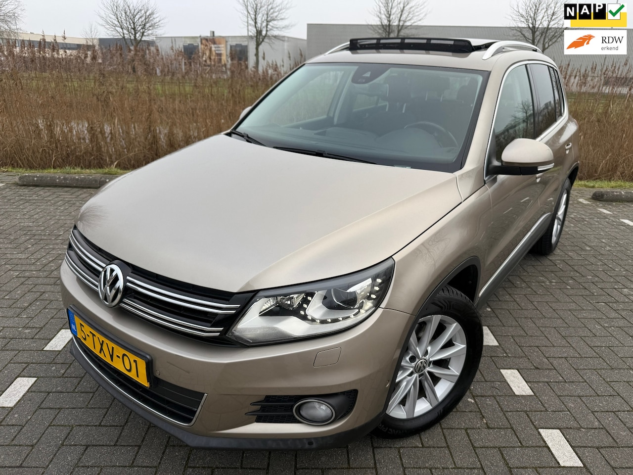 Volkswagen Tiguan - 1.4 TSI Sport&Style*AIRCO*CRUISE*OPEN DAK*PARK SENSOREN*NEW APK - AutoWereld.nl