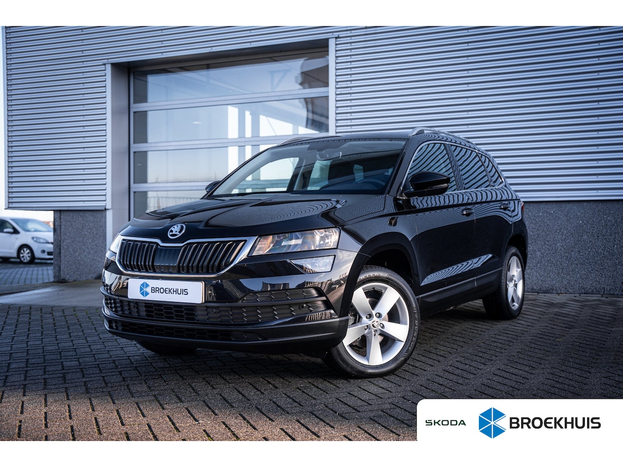 Skoda Karoq - 1.0 TSI DSG Ambition Business | Achteruitrijcamera | Cruise control adaptief | Elektrisch - AutoWereld.nl