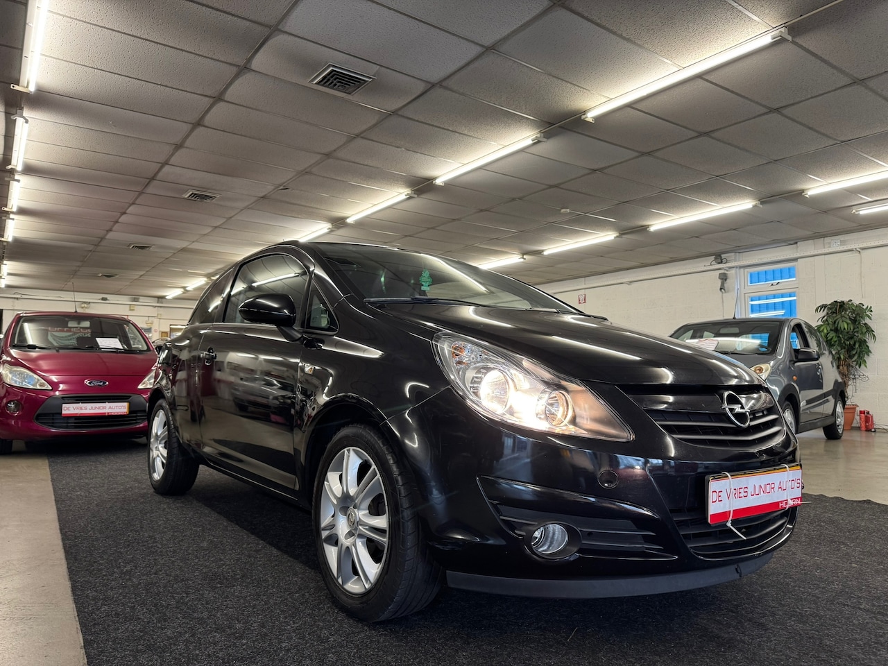 Opel Corsa - 1.4-16V Color Edition. Cruise control, airco, LM en meer! - AutoWereld.nl