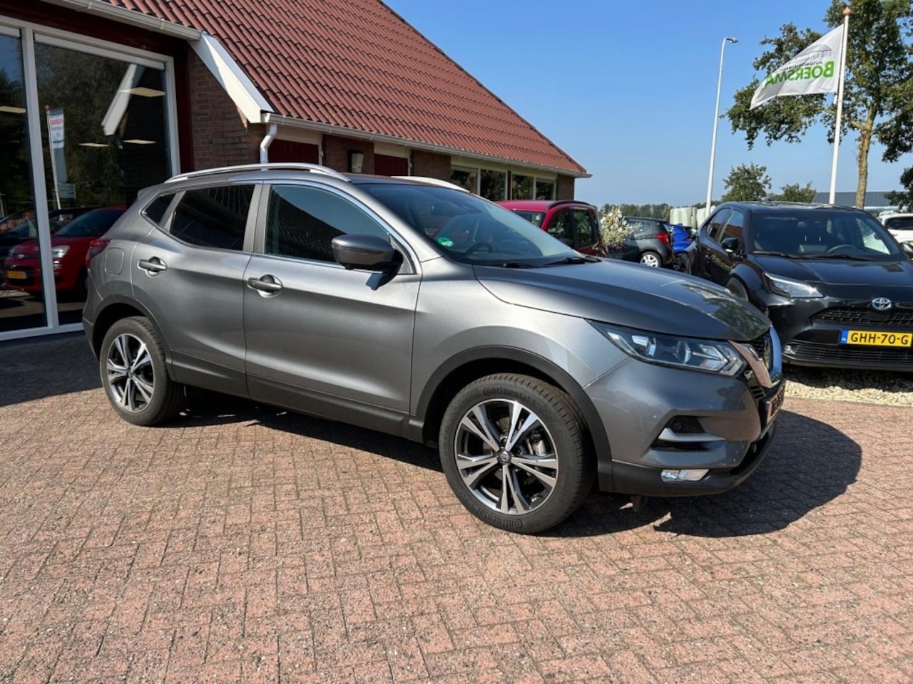 Nissan Qashqai - 1.2 N-CONNECTA SLECHTS 45.161 KM! AIRCO/VELGEN/NAVI/PANO DAK/ - AutoWereld.nl
